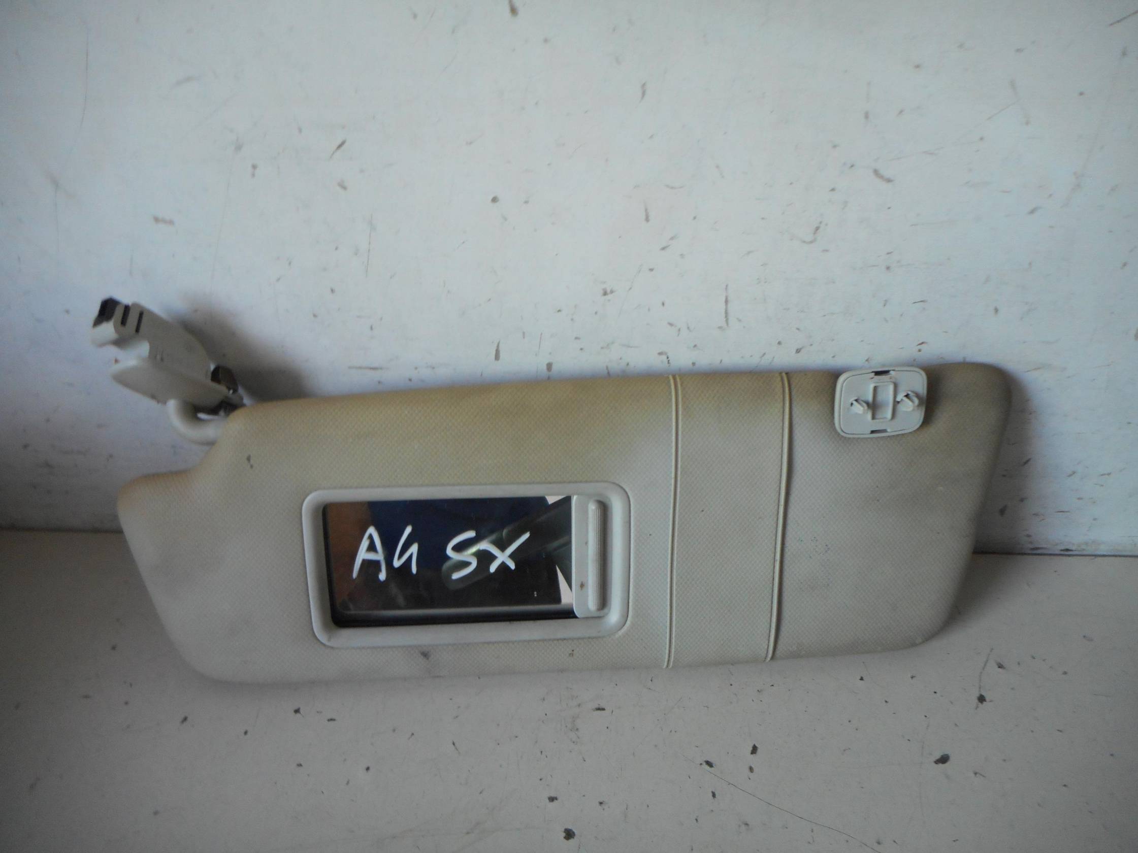 Aletta parasole parabrezza sx.